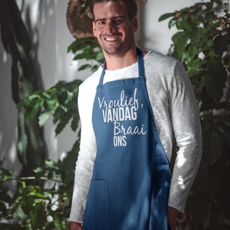 portrait-of-a-bar-tender-wearing-an-apron-mockup-near-plants-a19866